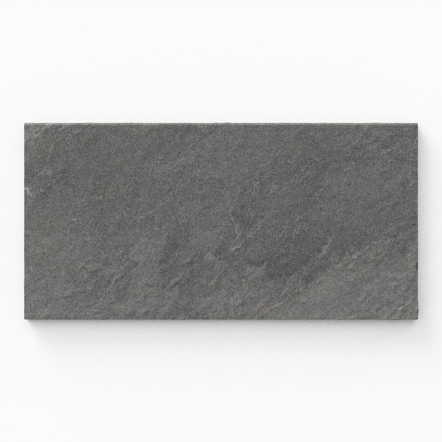 Bowden 12x24 Grip Porcelain 2cm Coping in Charcoal, showcasing rich dark gray tones with a textured finish for sleek outdoor elegance.