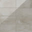 12x24 porcelain tiles with a soft neutral taupe palette and a sleek, polished concrete finish for modern sophistication