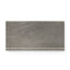Ramsey 6x12 matte cove base tile in a sleek, modern grayish-brown tone with a smooth concrete-inspired finish