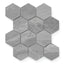 Matte hexagonal tiles in a sleek iron grey hue, highlighted by subtle natural veining, bring a refined modern touch.
