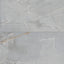 Astrid 24x48 matte porcelain tile in slate, showcasing cool gray hues with soft white veining and subtle golden accents for a sophisticated stone-like look.