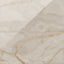 Astrid 24x48 polished porcelain tile in Sand, showcasing its warm beige tones and natural stone-like veining.