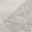 Astrid 24x48 polished porcelain tile in Oyster, featuring its soft neutral tones and intricate marble-like veining.