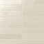 Glossy Teagan 3x12 ceramic tiles in cream, showcasing a subtle sheen and smooth finish for refined wall designs.