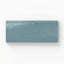 Glossy 3x6 bullnose tile with a rich blue-teal hue, ideal for adding vibrant coastal charm
