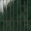 Deep forest green Jaden Hunter 2.5x16 glossy ceramic tiles, featuring a rich, reflective surface and subtle tonal variations for a dramatic and luxurious design statement.