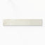 Kendrick Sand 4x24 bullnose tile in a satin finish, offering warm beige hues with soft veining for a refined and polished edge detail.