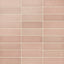 Ellie ceramic subway tiles in a warm matte finish, showcasing soft pink tones for a subtle and elegant design