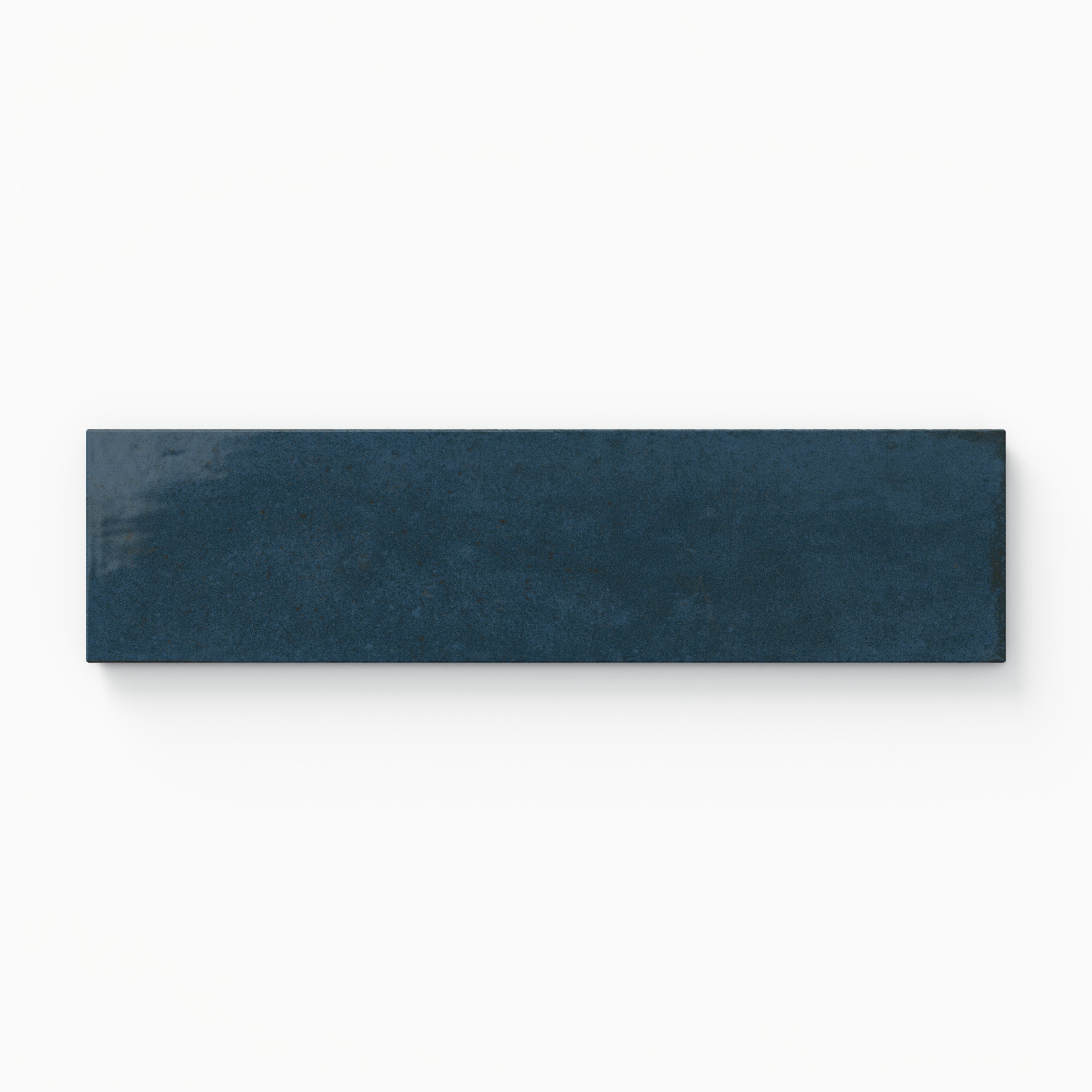 Rectangular porcelain tile in a dark blue shade with a glossy finish and subtle tonal shifts.