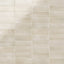 A 2x6 porcelain subway tile in soft beige, featuring a glossy finish, and a clean stacked layout with fine grout lines.