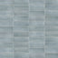 A 2x6 porcelain subway tiles in light blue, featuring a matte finish, and a clean stacked layout with fine grout lines.