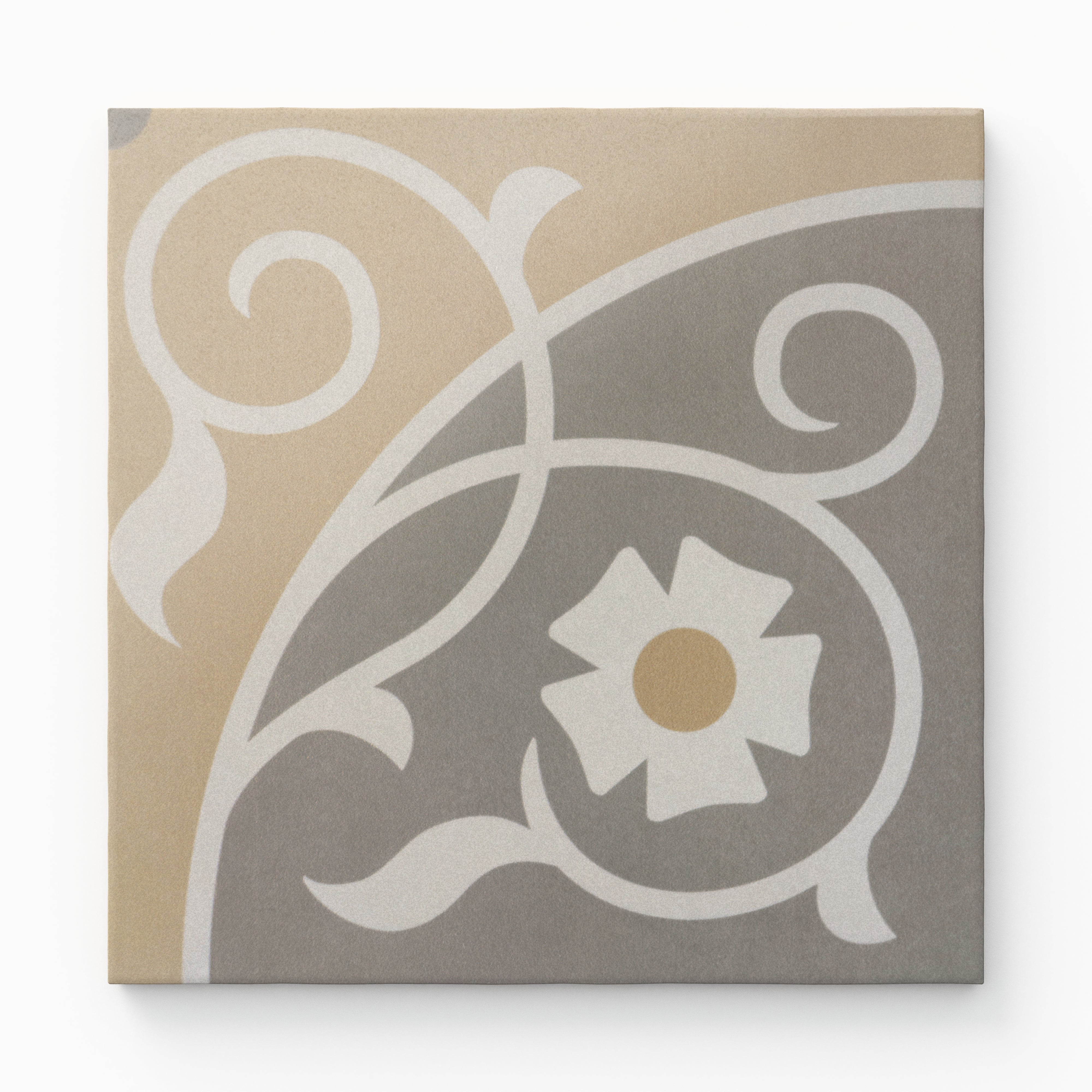 An 8x8 matte porcelain decorative tile featuring a vintage floral scroll in soft beige and grey, centered by a stylized daisy with a warm ochre core.
