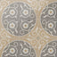 An 8x8 matte porcelain decorative tile featuring floral patterns in soft beige and gray, arranged in a circular quadrant with off-white scrollwork and golden-centered daisies.