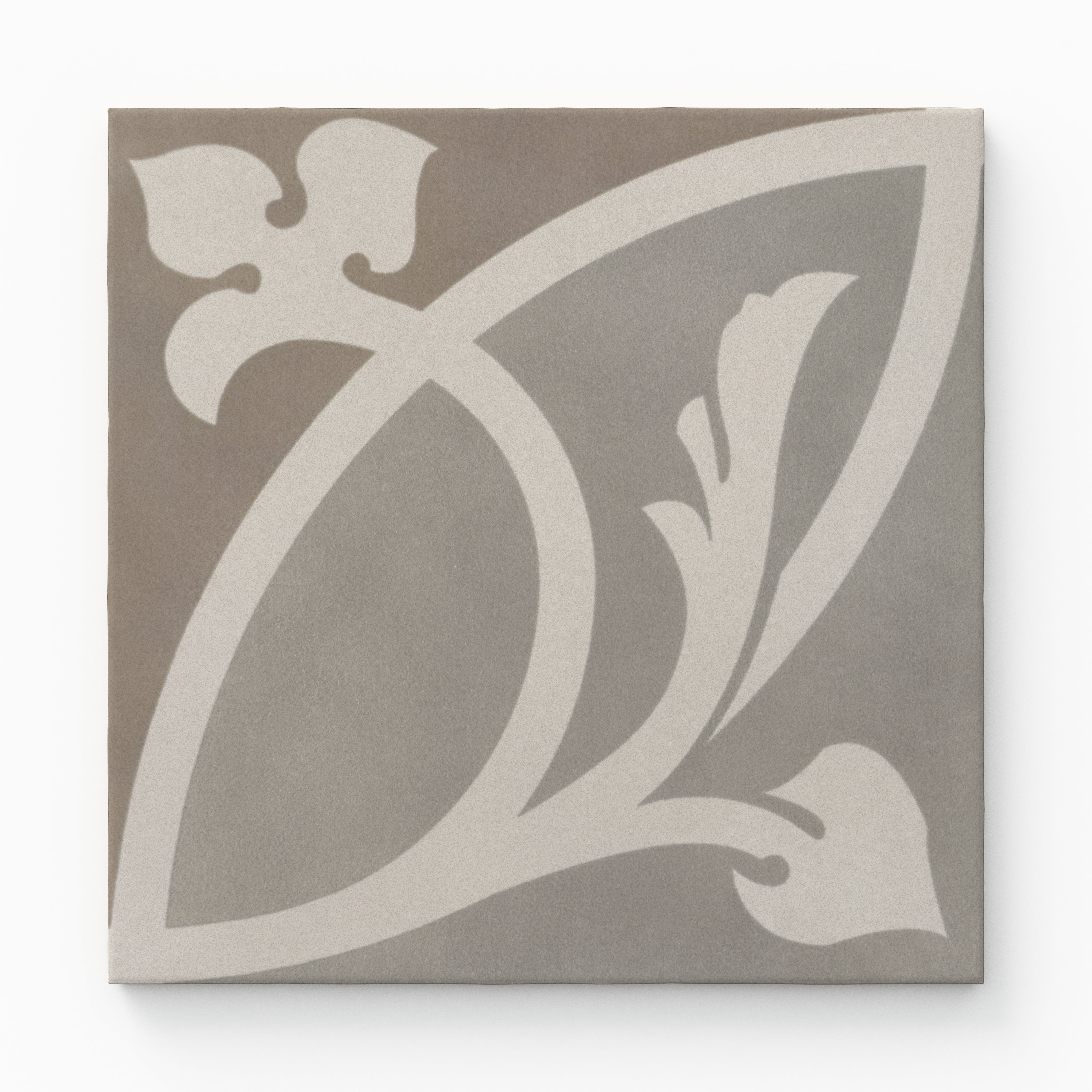 An 8x8 matte porcelain decorative tile in taupe and gray with a pale, sweeping floral silhouette, blending classic ornamentation with a soft modern palette.