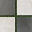 Porcelain pavers in rich charcoal and soft oat hues with lightly textured finishes, laid over grass in a checkerboard design for modern outdoor contrast.