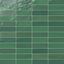 Glossy ceramic 2x8 subway tile in rich emerald green, featuring a handcrafted look with subtle surface variations for added depth and character.