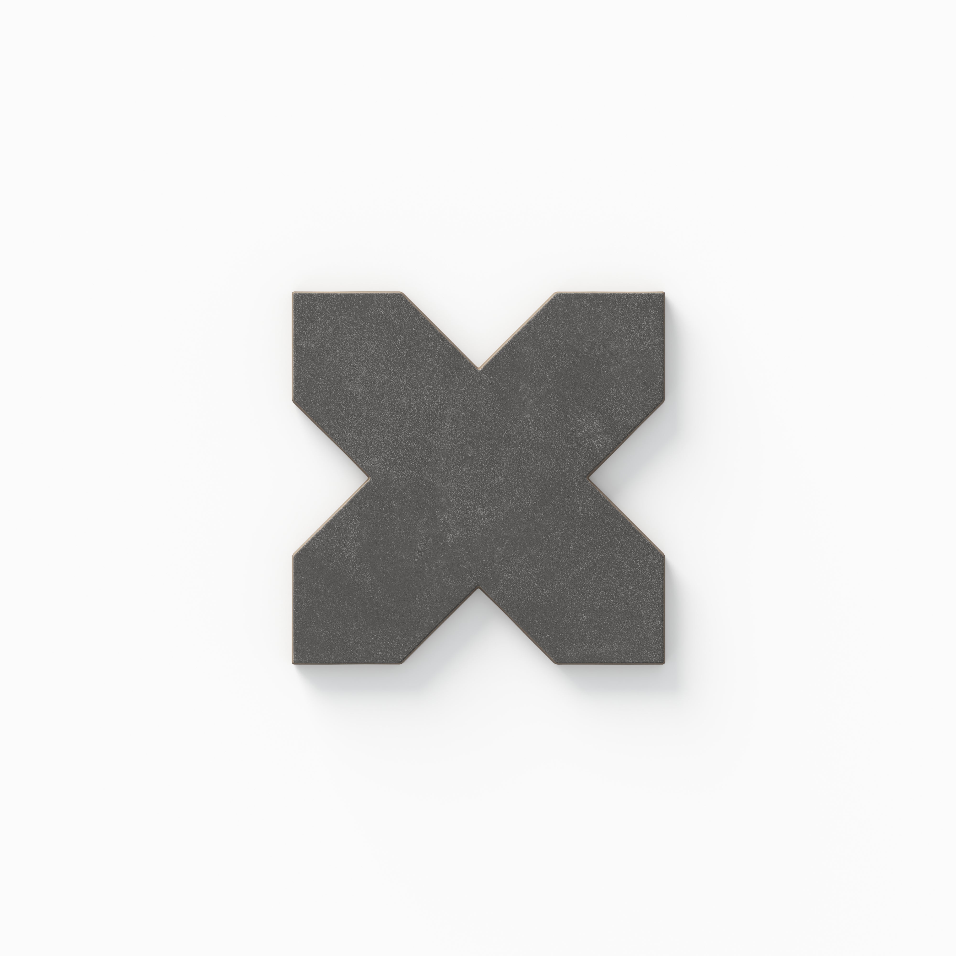 Isabel 11x11 Matte Porcelain Tile Star in Rust and Cross in Charcoal shows a timeless cross form in deep gray, highlighted by gentle cement-plaster texture and a powdery matte surface.