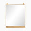 Rectangular mirror with a slender brass frame and top rail accent, perfect for elevating modern and transitional spaces