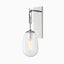 Polished nickel wall sconce with a frosted teardrop glass shade suspended from a sleek hook.