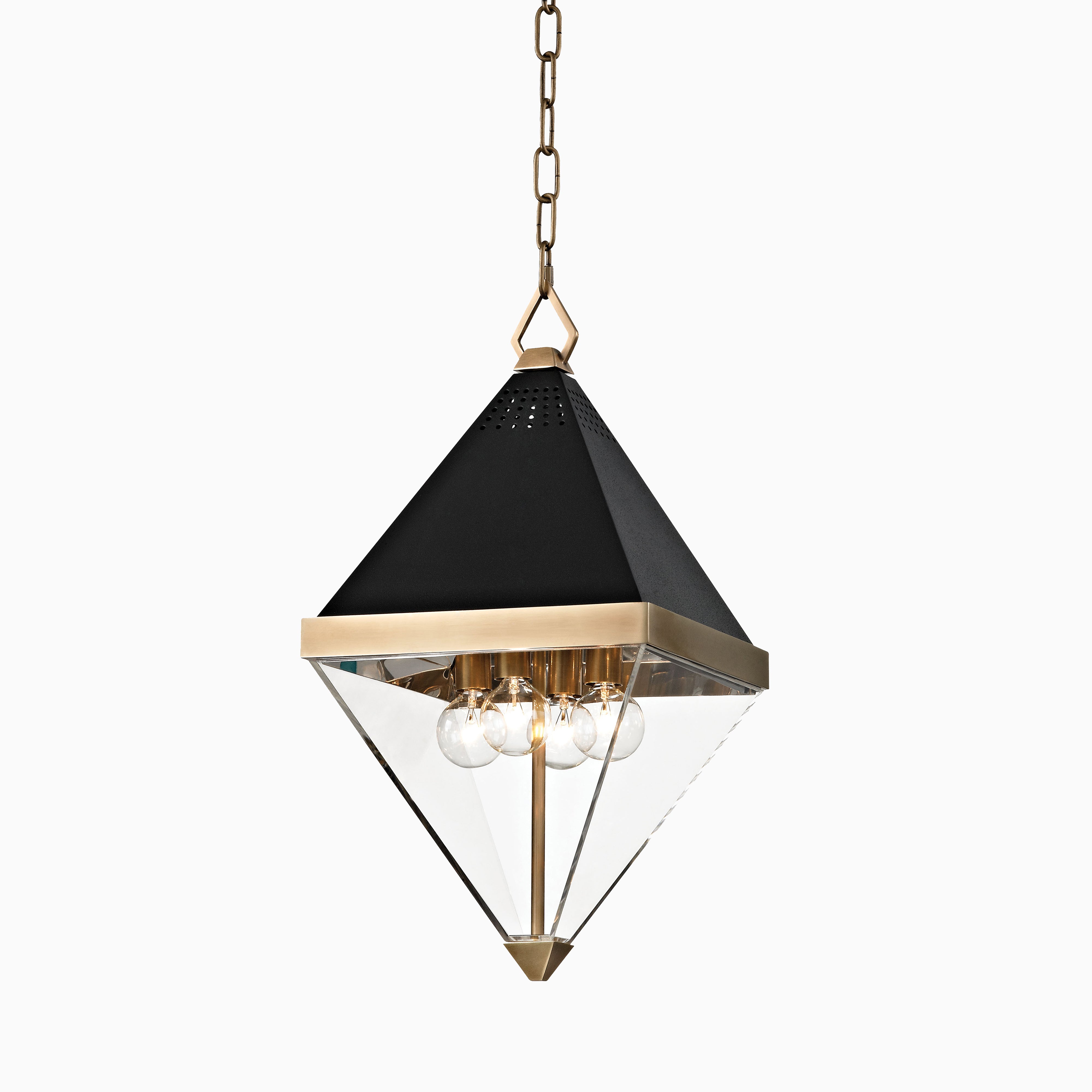 Lantern in aged brass with a black pyramid top, clear glass panels, and exposed bulbs, suspended by a chain for modern geometric style.