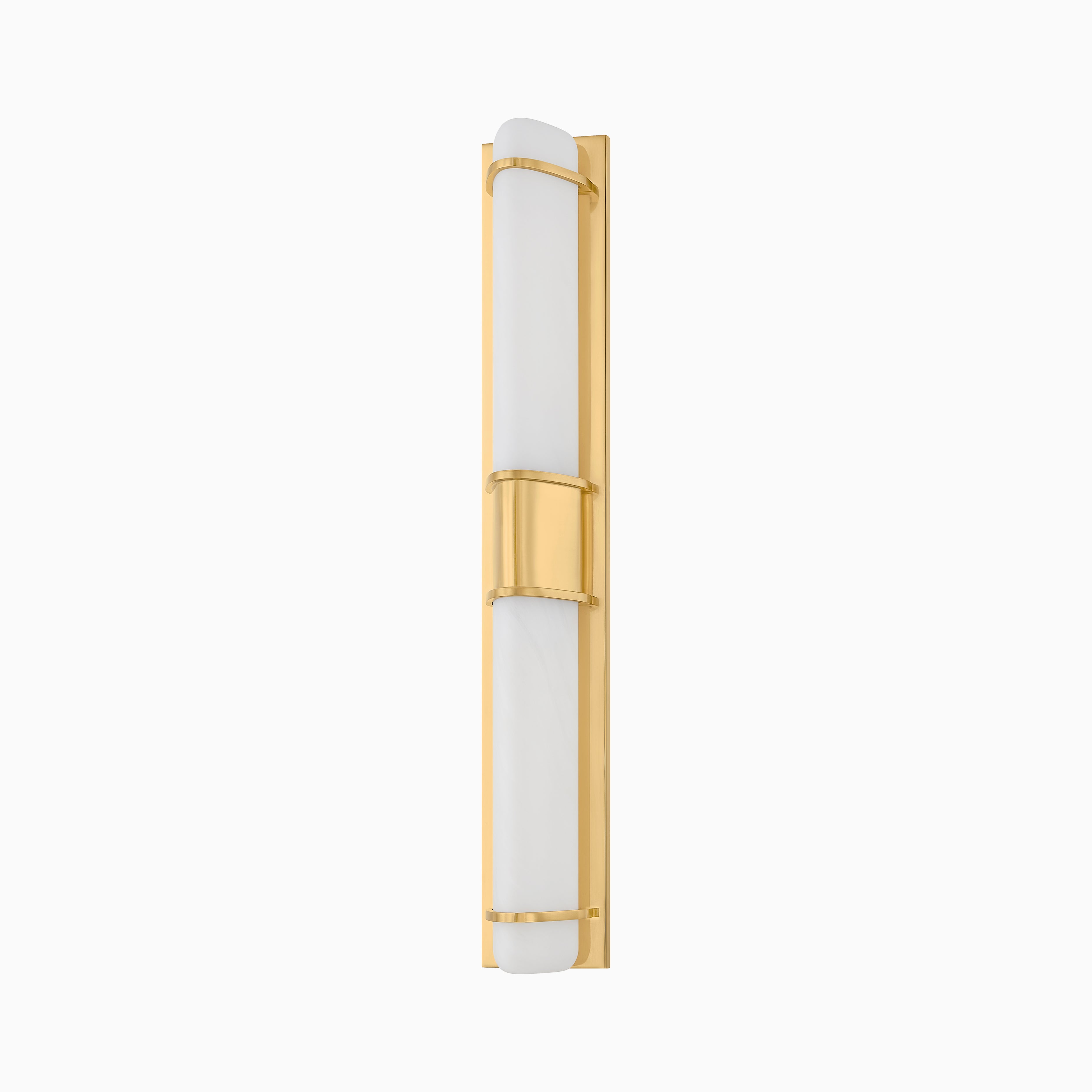 Vertical wall sconce with a matte triangular glass shade and warm aged brass frame, offering timeless elegance and glow.