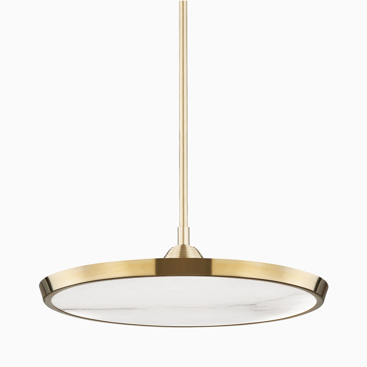 Modern round pendant light in aged brass finish with a flat circular shade, suspended by a slim rod for sleek contemporary design.