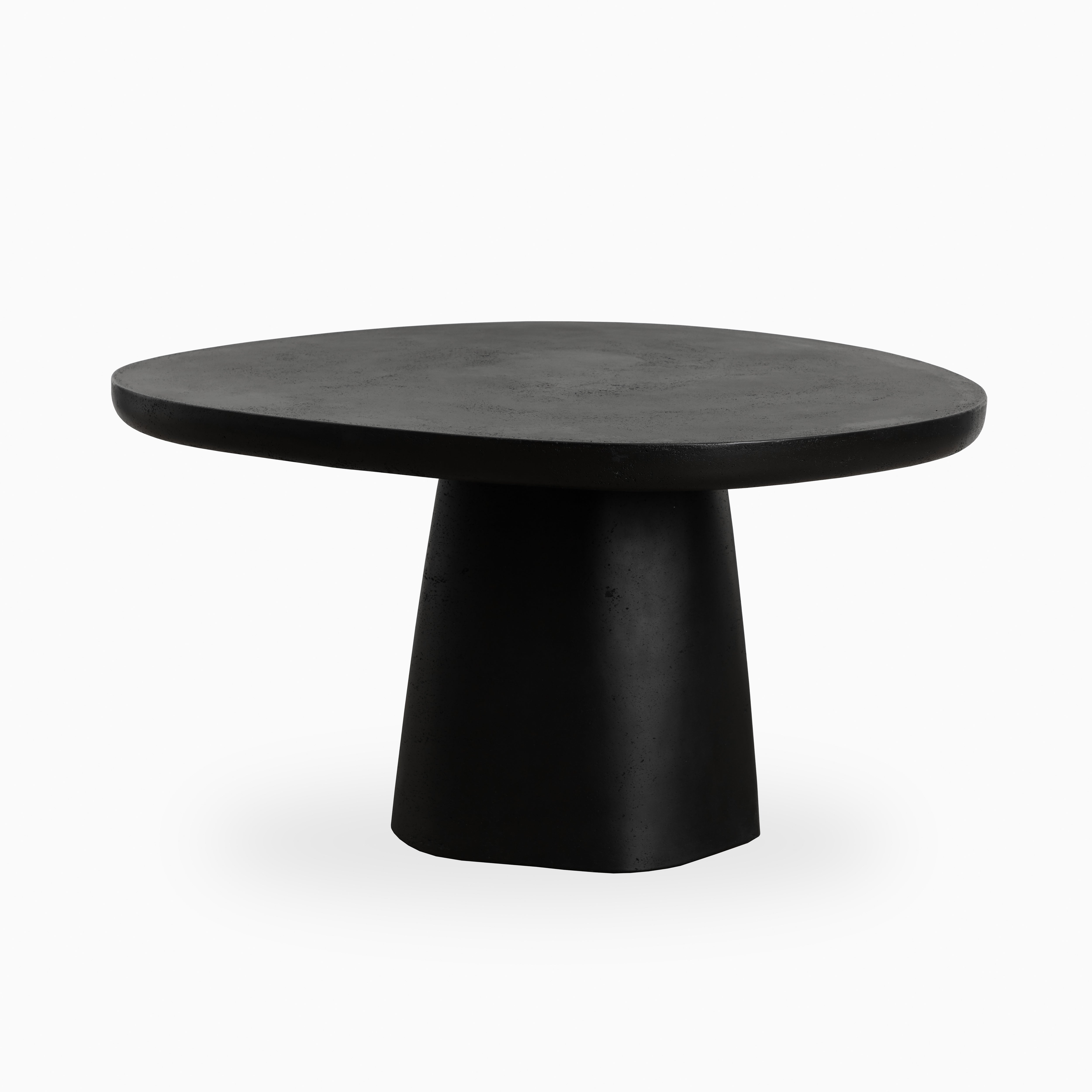55" round outdoor dining table in black finish with solid sculptural base and smooth top, offering a bold modern minimalist design.