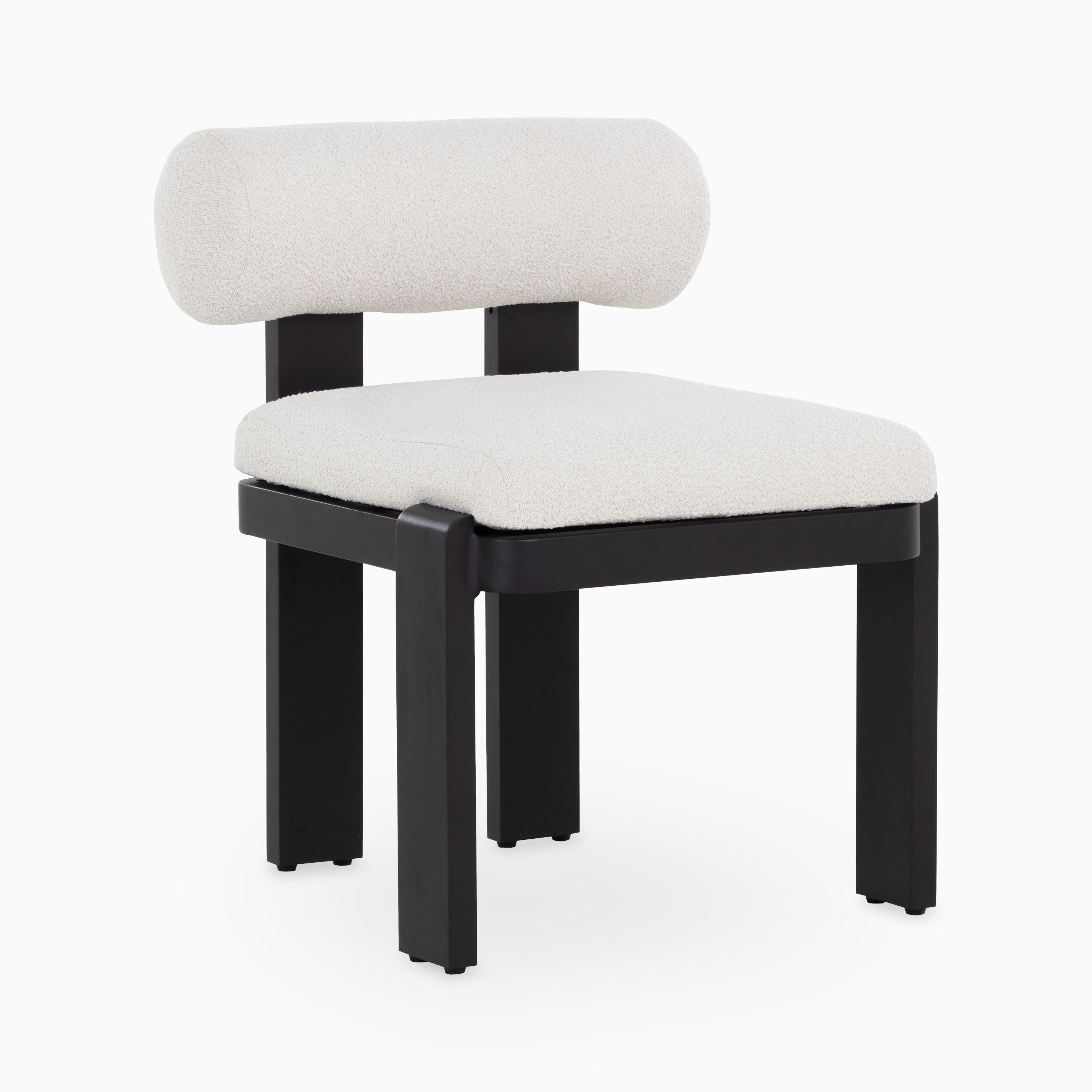 Minimalist accent chair with a rounded off-white bouclé backrest, plush seat, and black wood frame in a modern silhouette.
