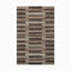Power loomed rug from Egypt made of polypropylene, featuring an abstract linear pattern in earthy brown, beige, and taupe tones.