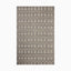 Textured hand loomed rug made of nylon and wool with a woven checkerboard pattern in earthy gray and beige tones, adding depth and dimension to any space.