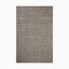 Dark gray hand loomed rug made of nylon and wool with a woven texture and intersecting linear pattern, creating a sophisticated and organic fabric-like effect.