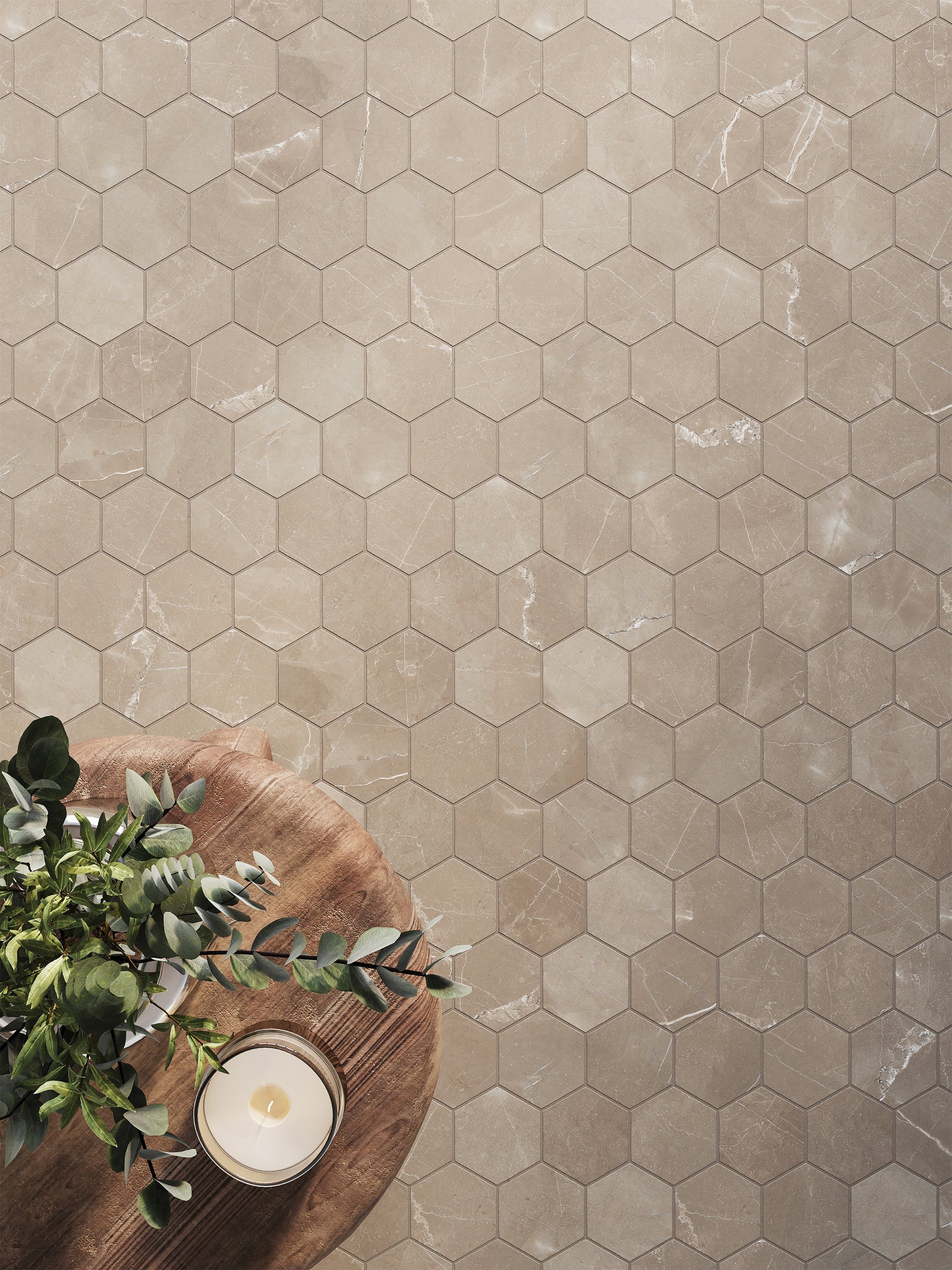 Leona Amani Bronze 3x3 hexagon mosaic matte tile used as flooring, featuring subtle veining and a warm bronze tone.