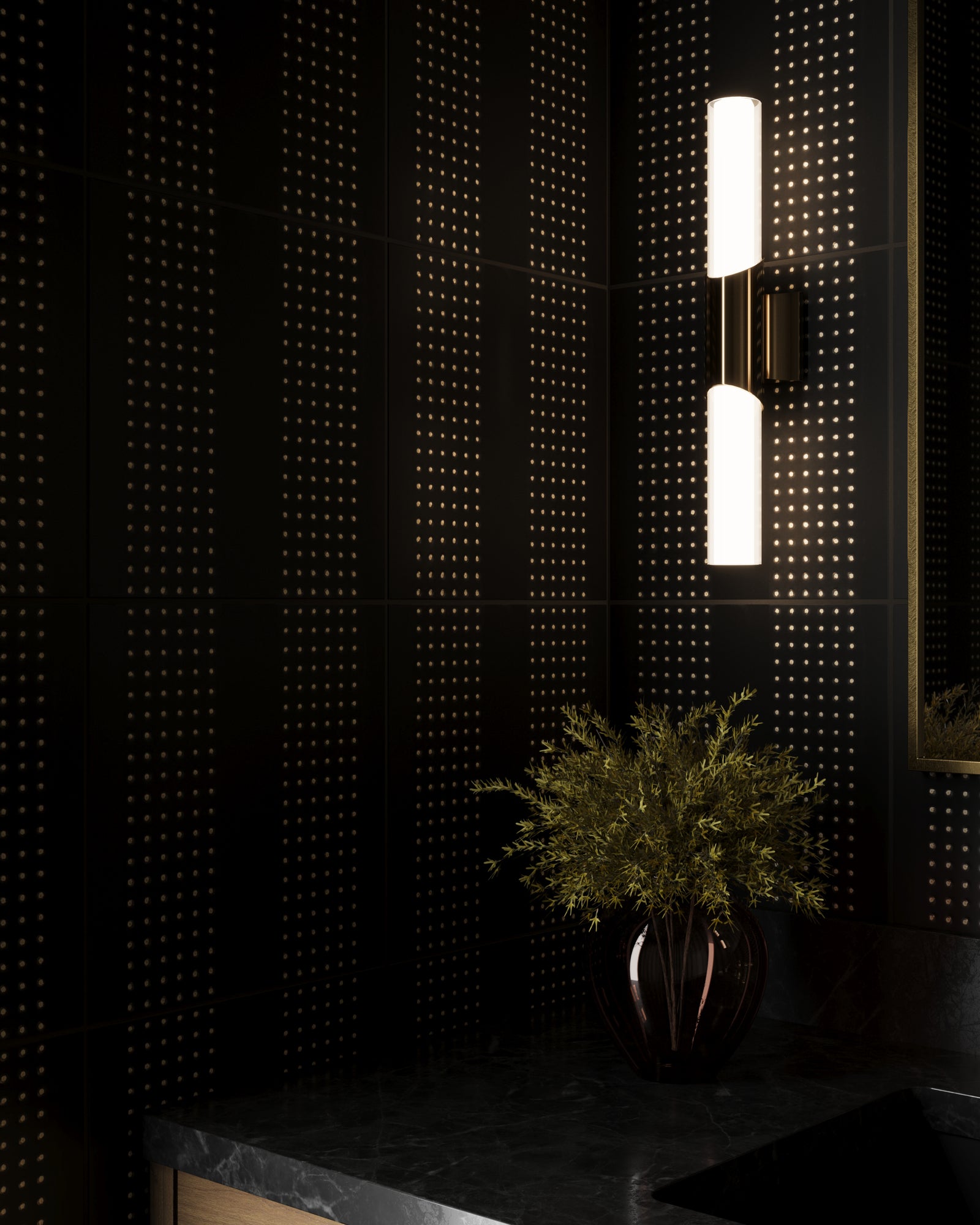 Elegant close-up of Kira Striped Dots Black 12x12 satin ceramic tiles with glowing wall sconce and a sleek black vase on a marble countertop