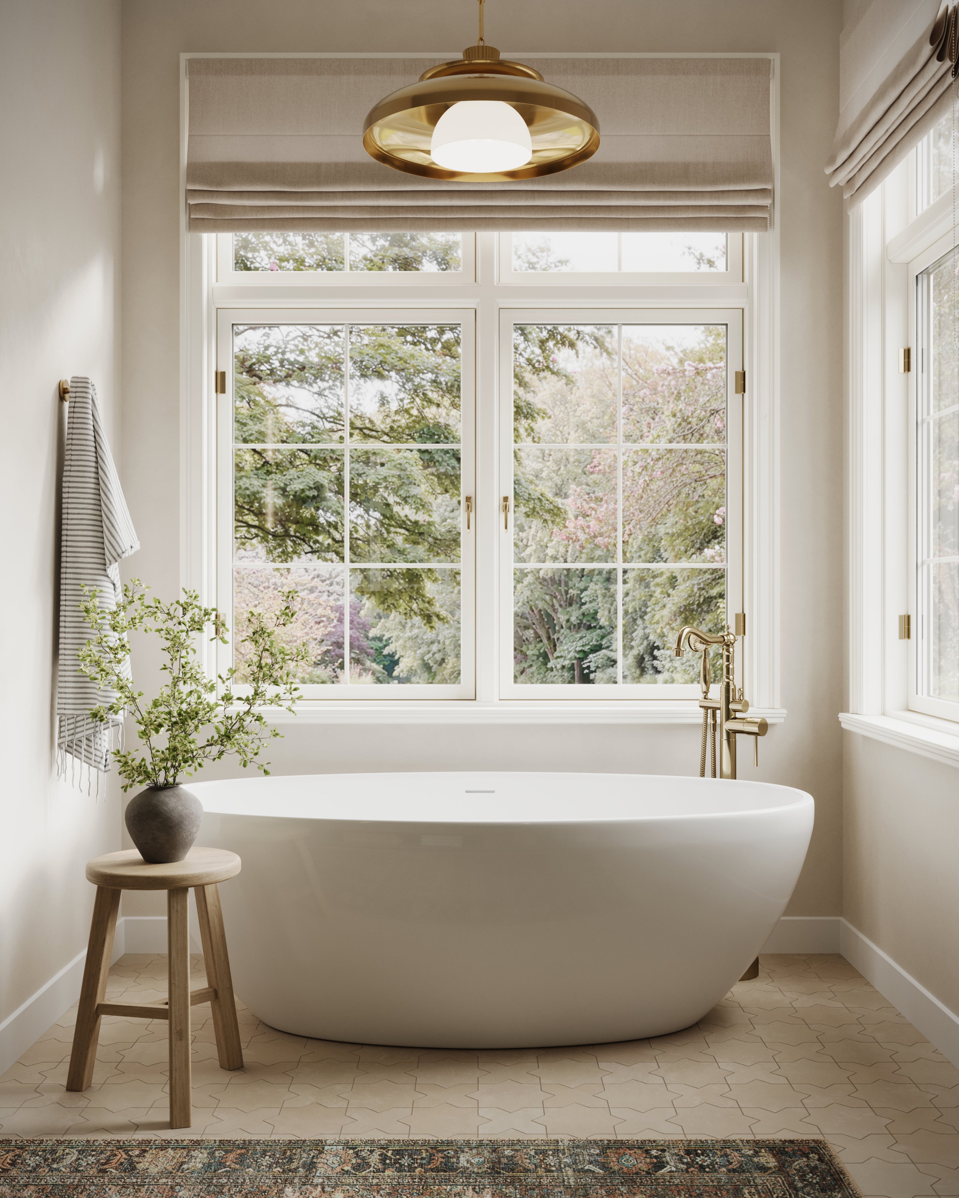 Vintage brass pendant light with a wide reflective dome shade and frosted diffuser hanging above a freestanding tub, adding warm ambient illumination to a serene, light-filled bathroom.
