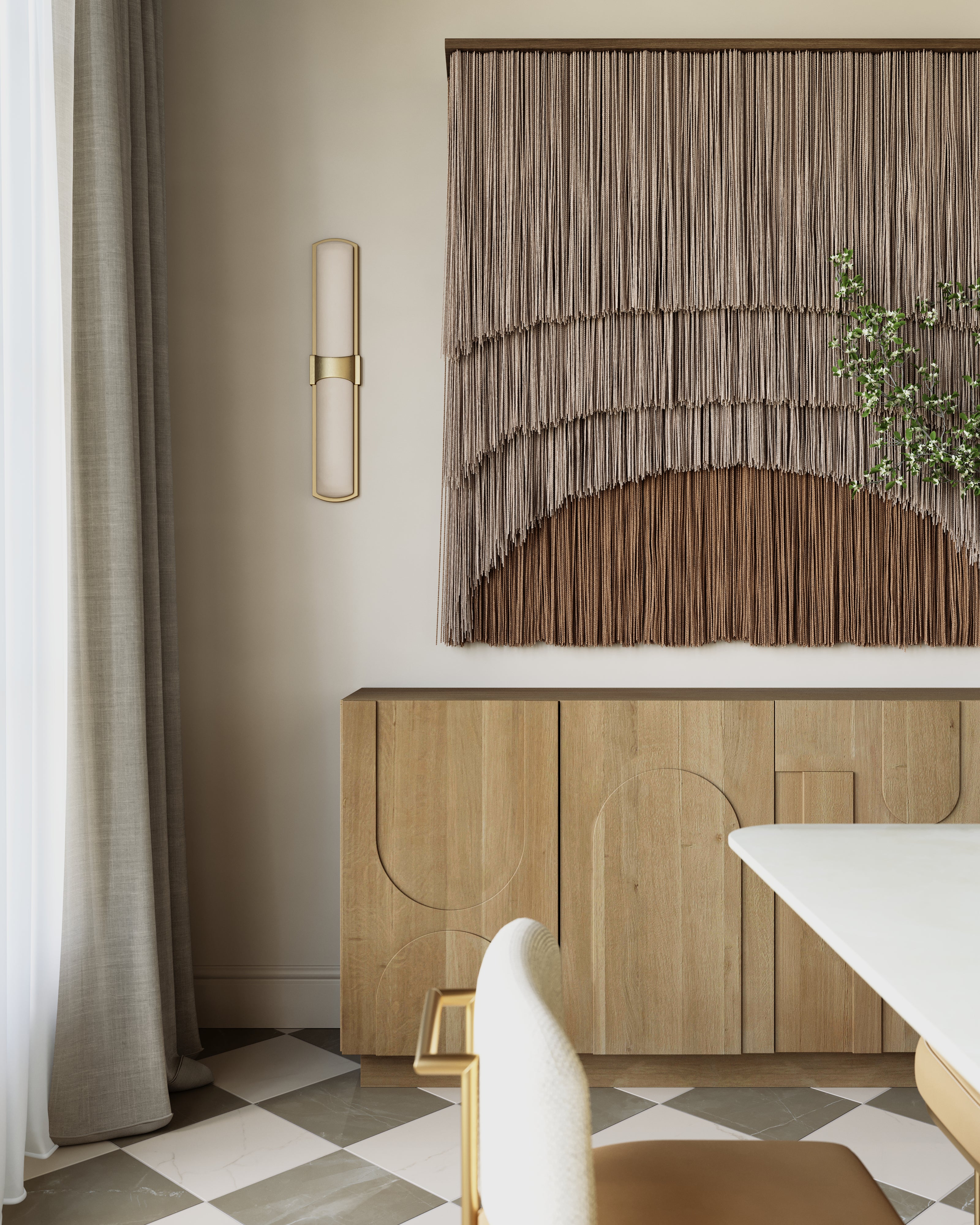 Light oak sideboard with subtle carved relief doors, paired with layered wall art, brass wall sconce, and neutral drapery in a refined dining room.