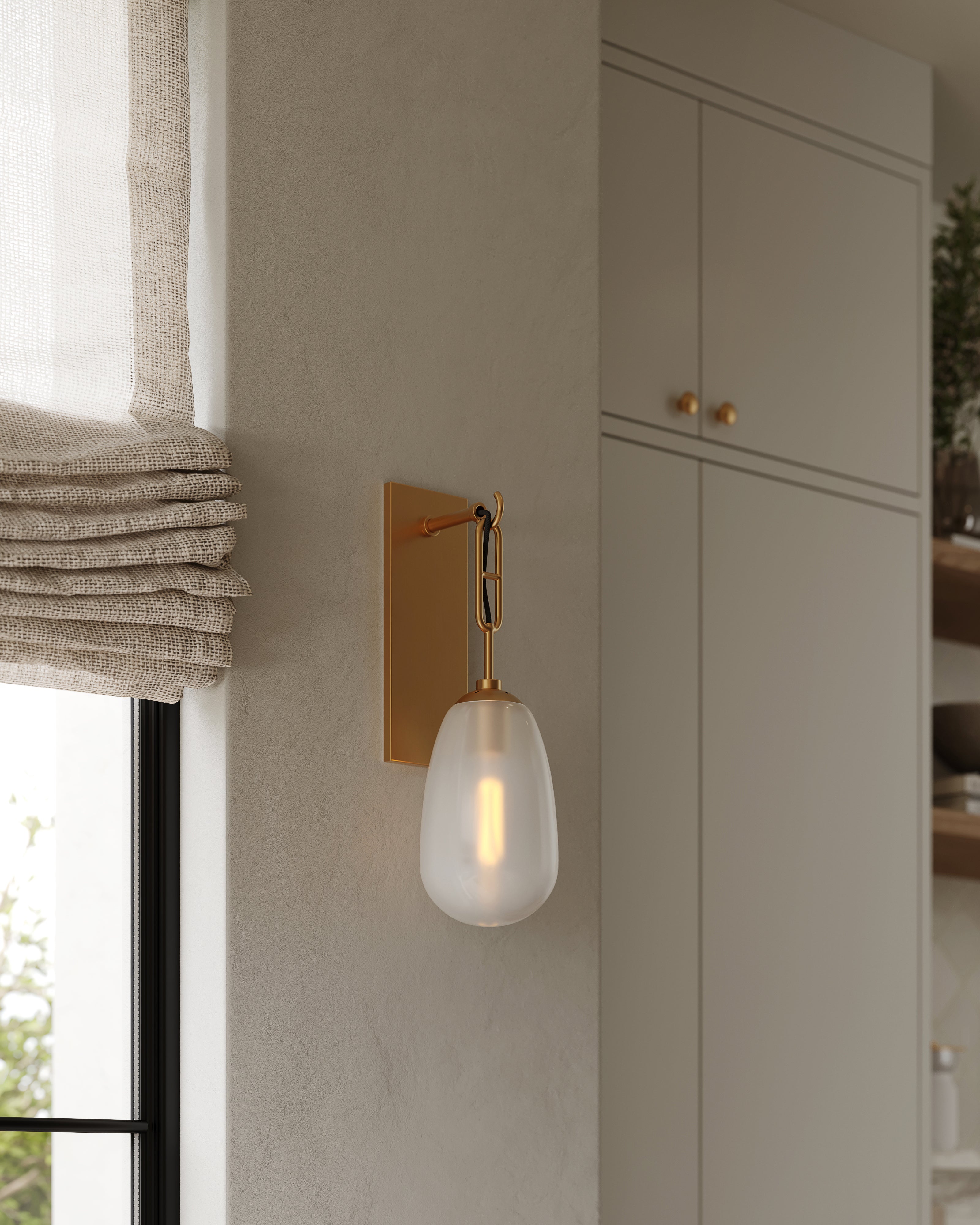 Runa Wall Sconce In Aged Brass