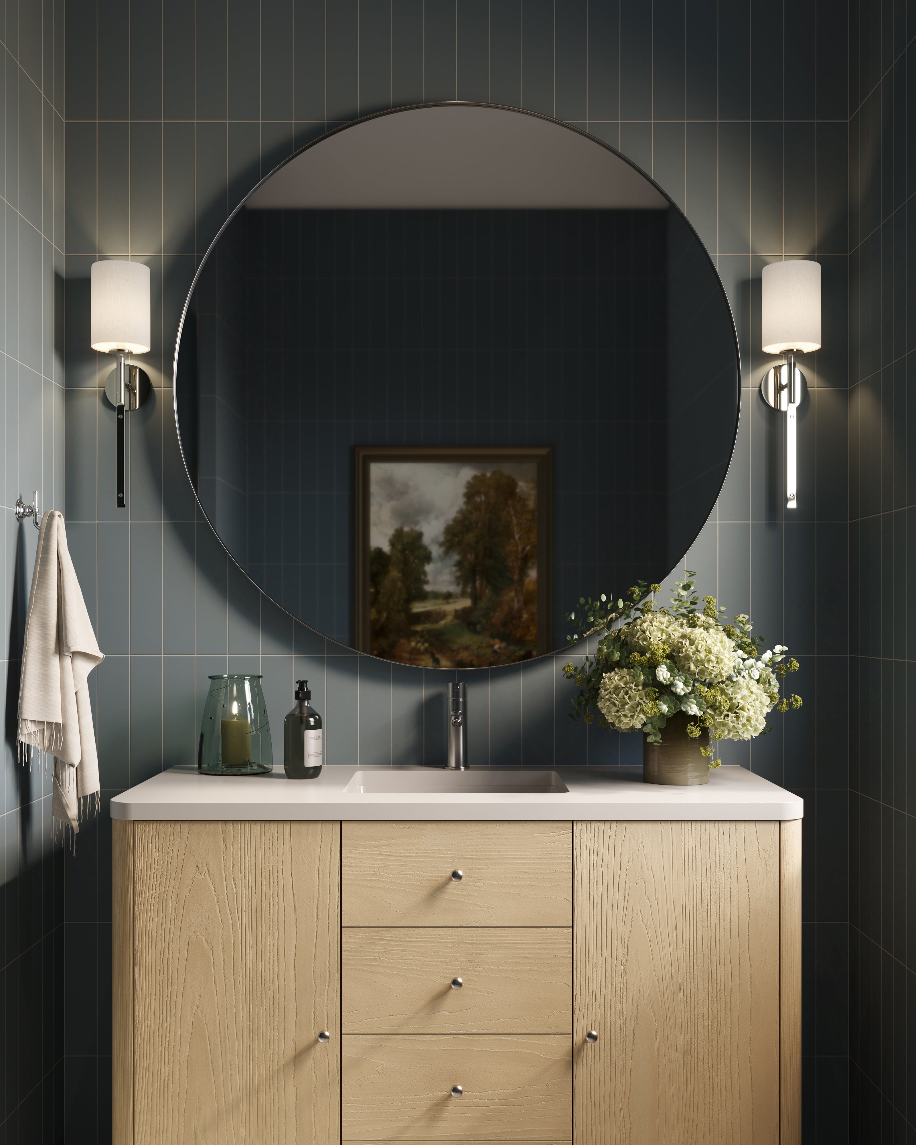 Tristan Round Mirror in Shiny Steel