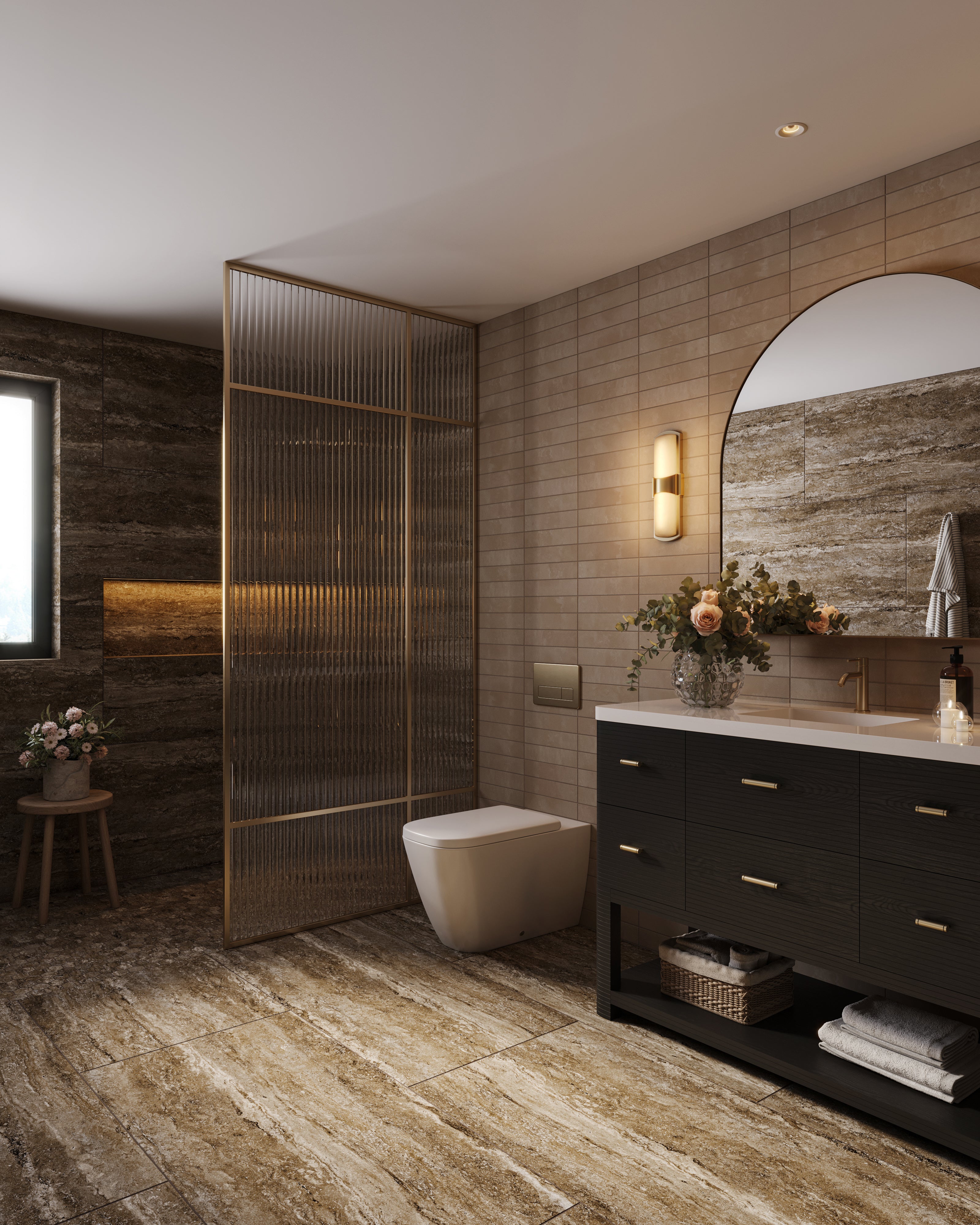 Carbon oak Paxton 48-inch vanity with white countertop, arched mirror, brass lighting, ribbed glass partition, and stone tile bathroom.
