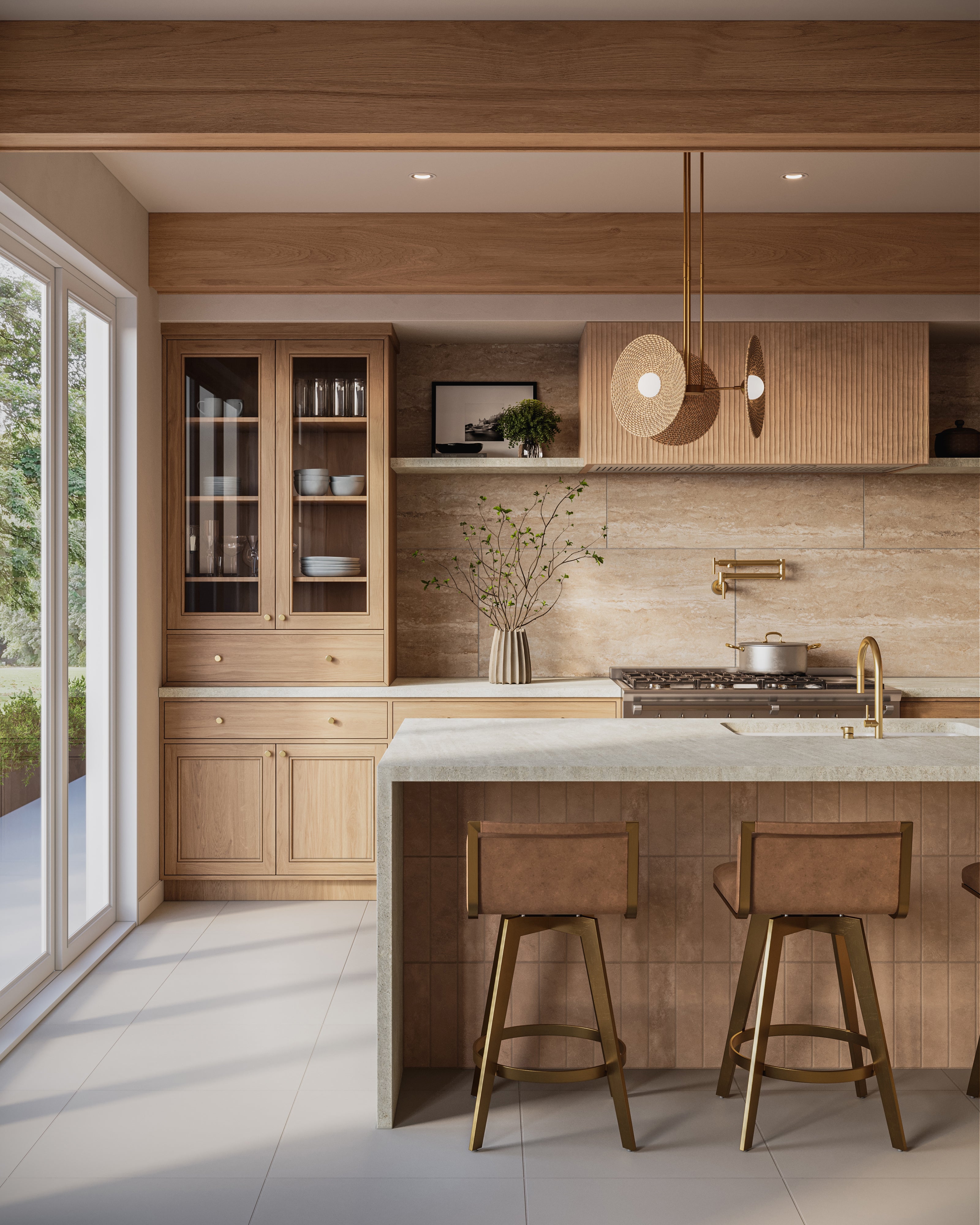 Vintage brass pendant light with woven rattan shades hanging above a warm wood kitchen island with brass stools.