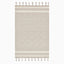 Hand loomed beige wool rug featuring a delicate diamond pattern, subtle woven details, and decorative fringe.