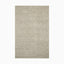 Made from a blend of wool and polyester, this handwoven rug features a warm beige base with a soft, textured surface, perfect for cozy interiors.