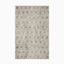 Made from high-quality polyester, this power-loomed transitional rug showcases a soft taupe-gray foundation with stone-washed accents for a timeless look.