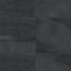 Matte rectangular tile in black and dark gray tones with deep stone-like texture and natural variation, ideal for bold, contemporary interiors and busy areas.