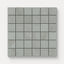 Matte square mosaic tiles in gray and soft blue hues with a subtle stone-like texture, perfect for creating a calm, modern look on walls, floors, or accent areas.