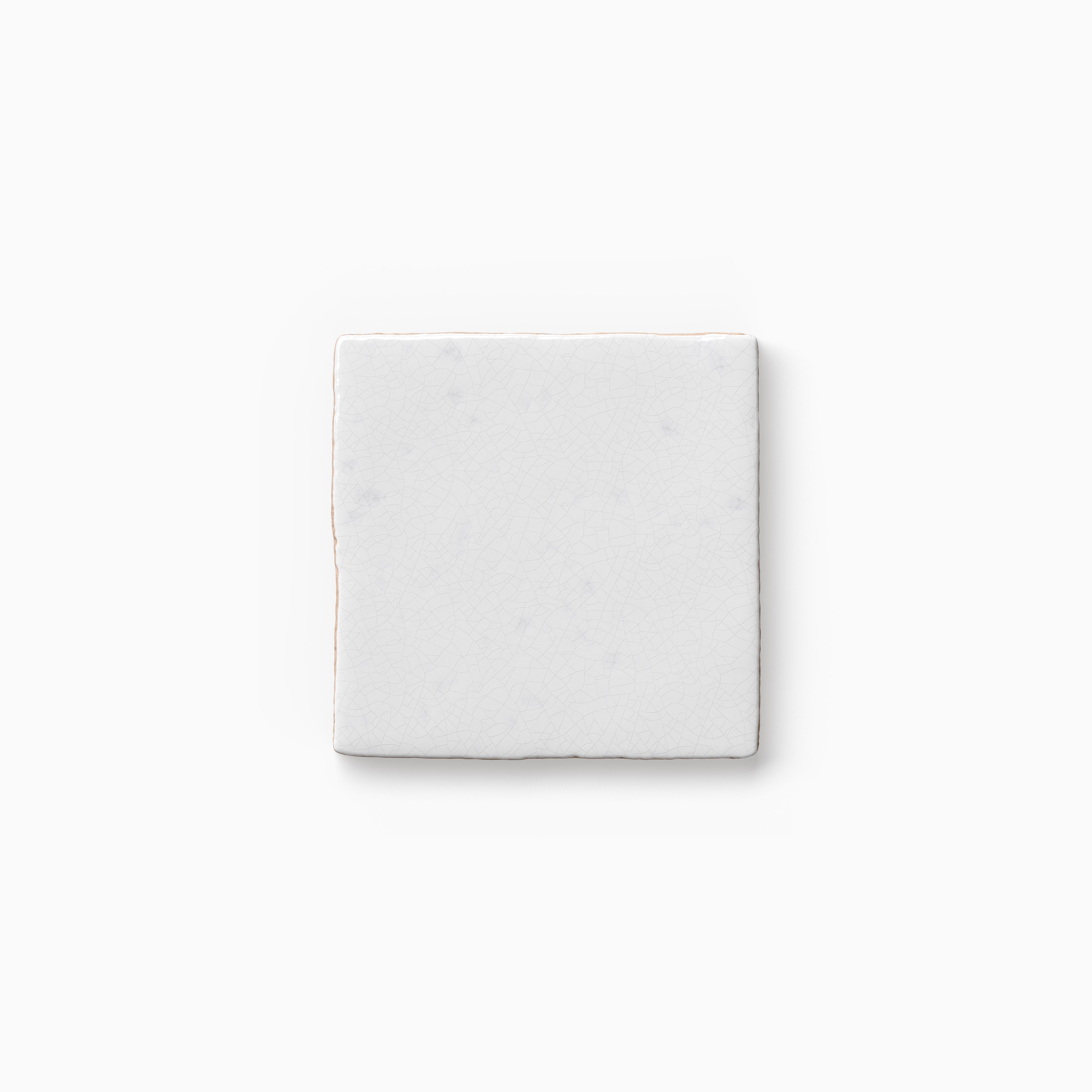 Square white tile sample featuring a handcrafted look, delicate surface variation, and a clean matte finish on a neutral backdrop.