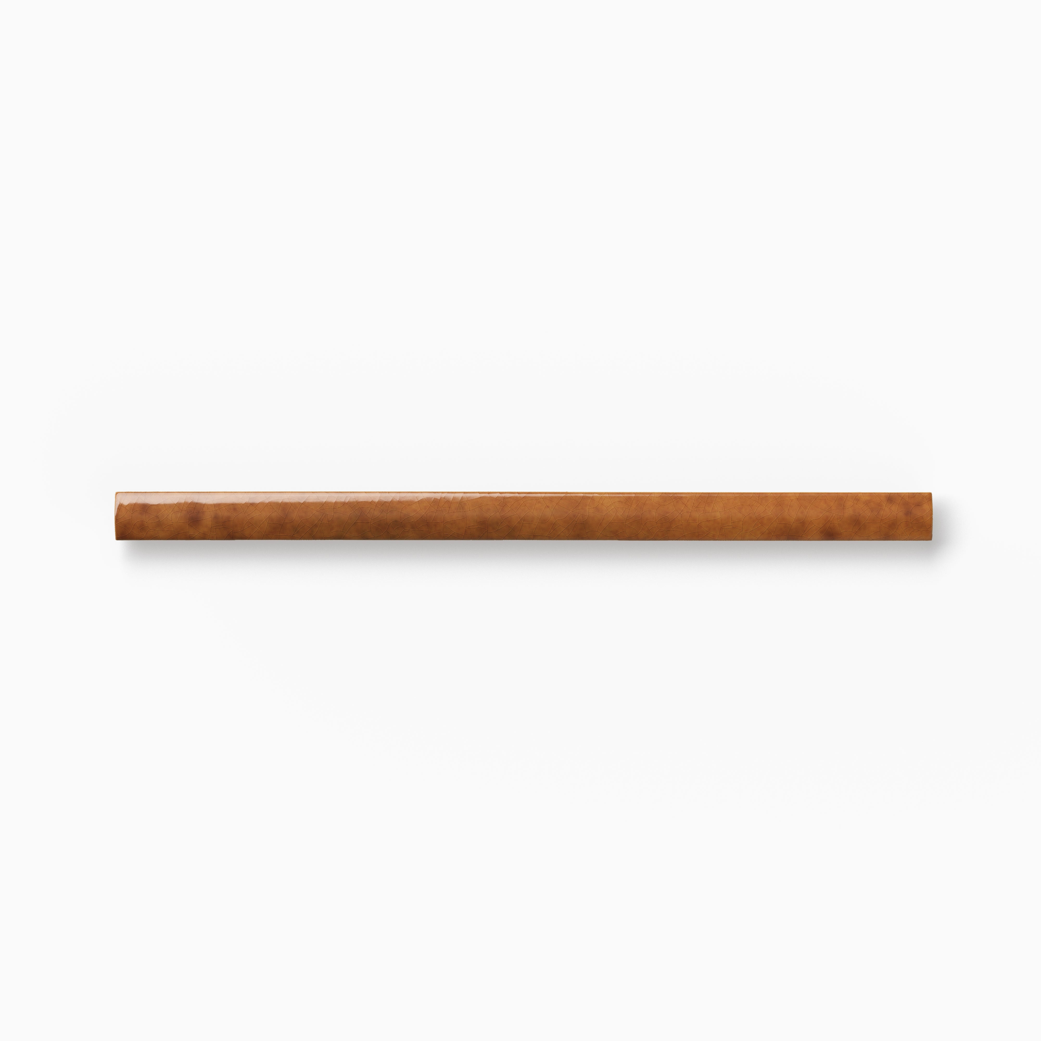 Warm brown ceramic rounded edge trim with mottled tonal variation, a handcrafted appearance, and a smooth bullnose profile against a white background.