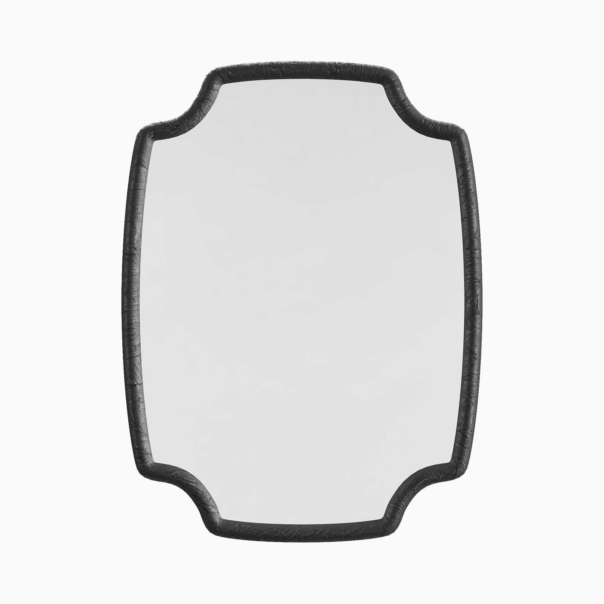 Quatrefoil-style wall mirror with a textured charcoal resin frame, combining classic form with rich detailing and modern appeal.