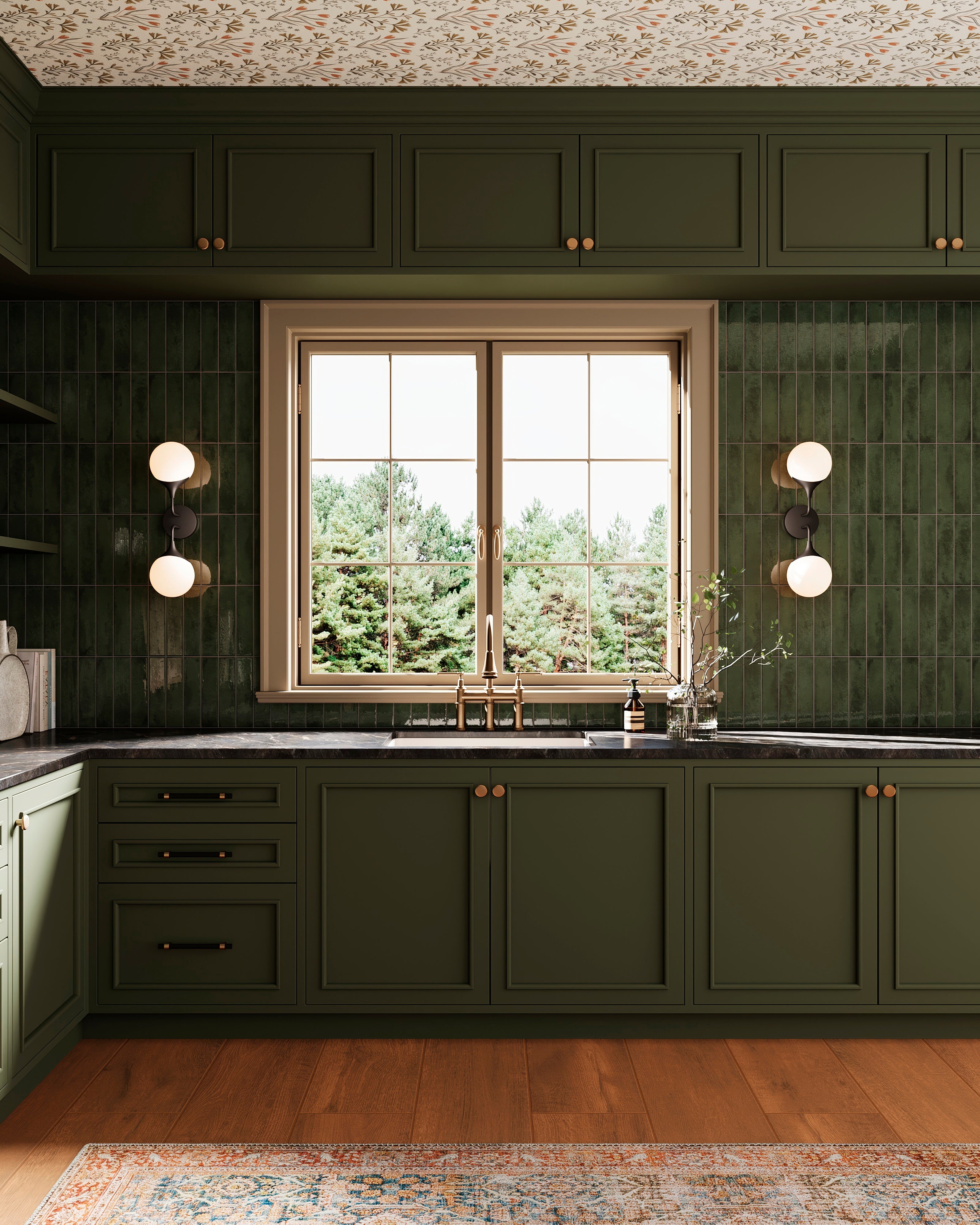 Matte black wall lights with frosted globe shades mounted on glossy forest green tiles beside a centered window, lighting a kitchen sink framed by deep green cabinetry.