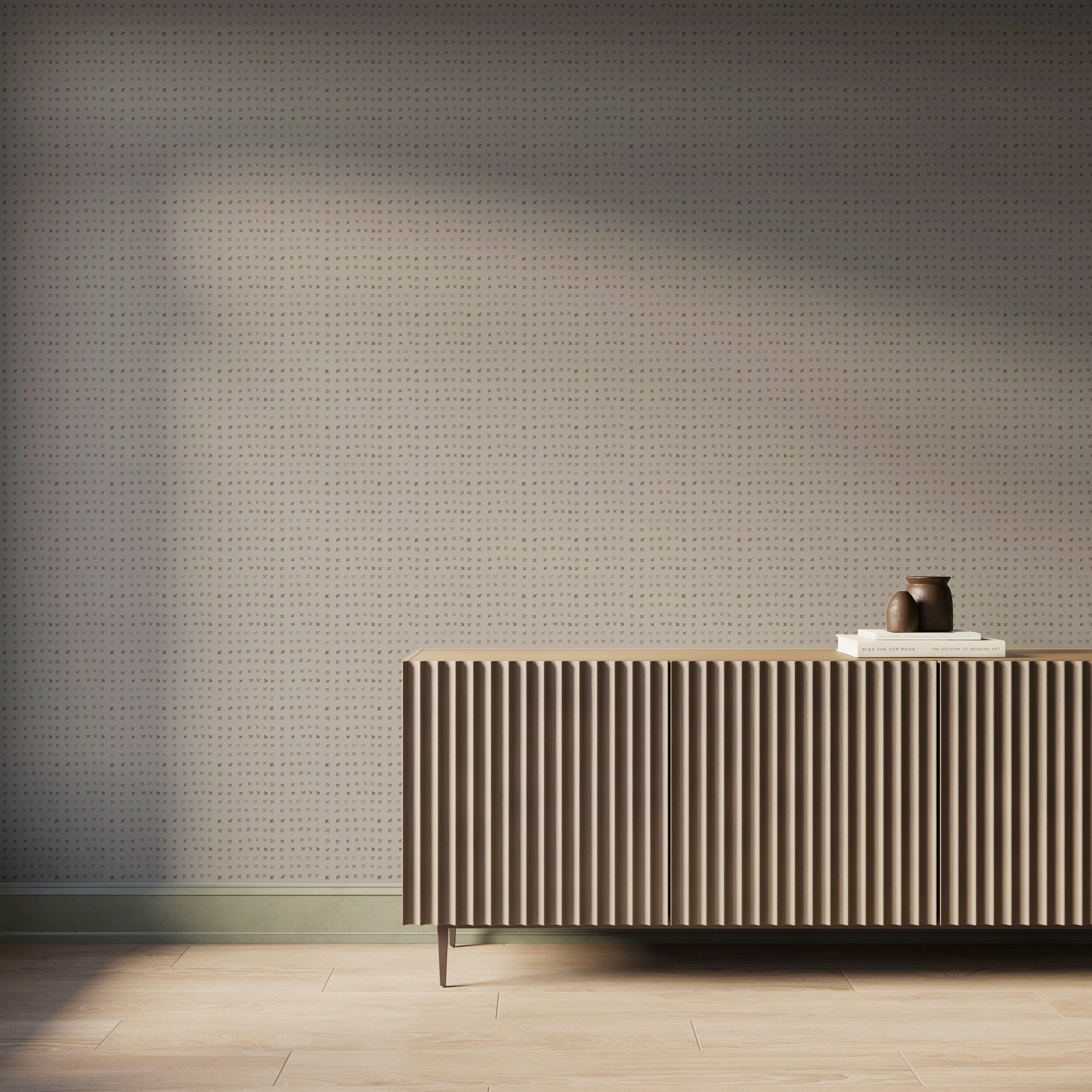 Somerset Wallpaper in Taupe I with dark taupe watercolor-style motifs across a light brown wall, styled behind a ribbed wood console in a warm modern interior.