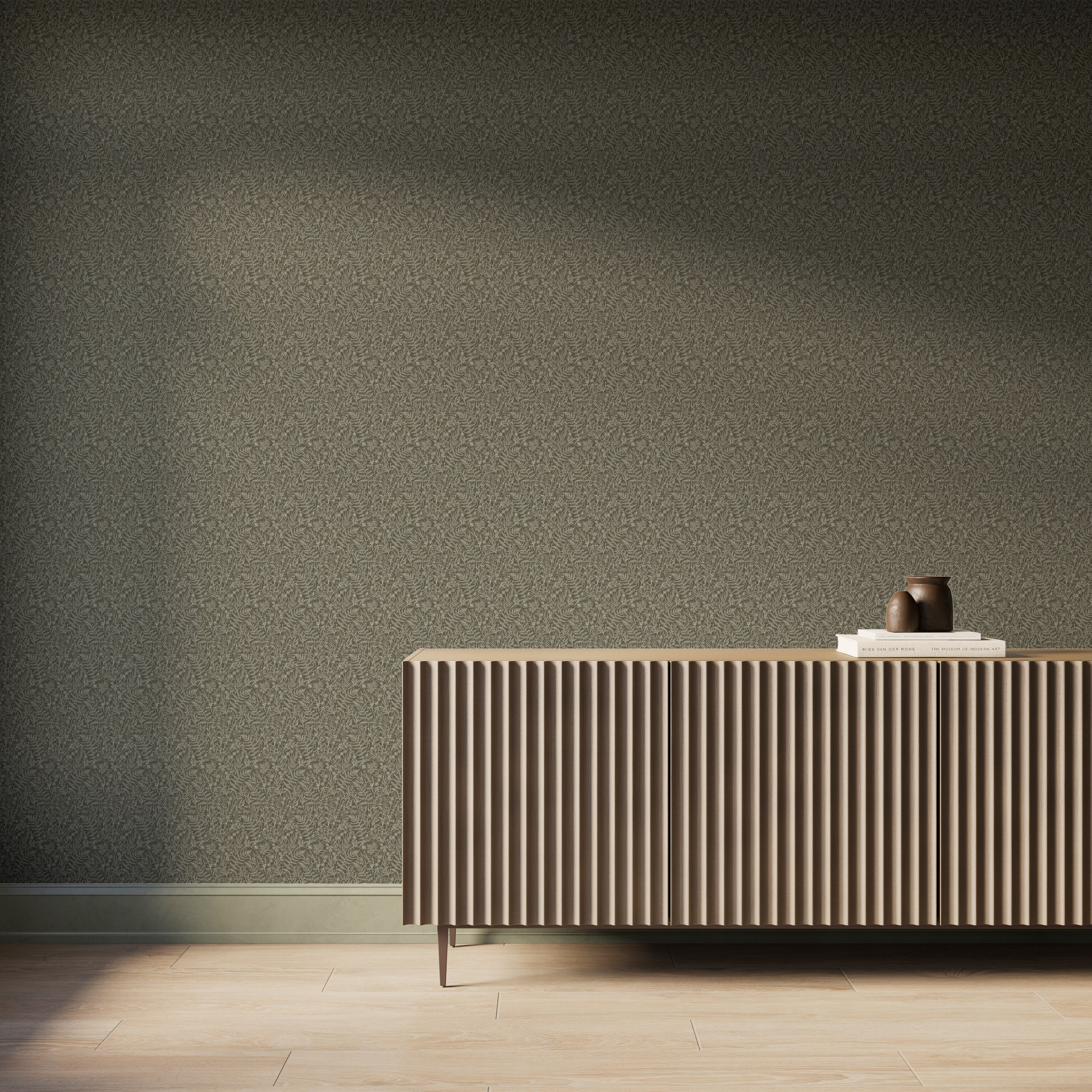 Modern interior featuring olive green botanical wallpaper with delicate creamy white hand-sketched foliage, paired with a fluted wood console cabinet, light wood flooring, and soft natural light casting gentle shadows across the wall.